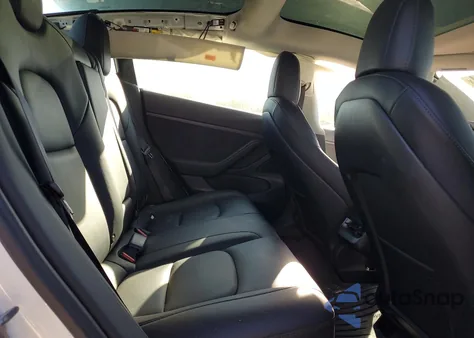 2021 Tesla Model 3 z USA, uszkodzony, nr VIN 5YJ3E1EA9MF919735